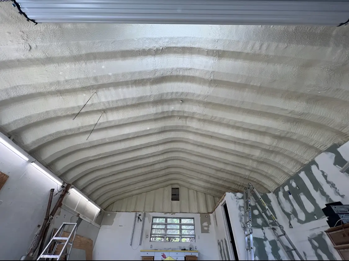 Spray polyurethane foam applied to the underside of a metal roof deck in Chestnuthill